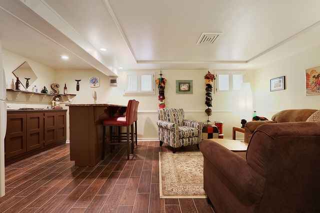 3490 Ronald Road Crete, IL 60417 - Photo 24 of 25 a living room with furniture and a wooden floor
