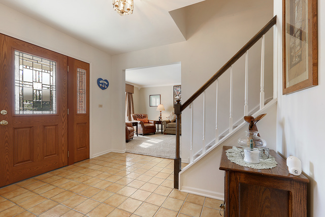 3490 Ronald Road Crete, IL 60417 - Photo 7 of 25 a view of entryway and hall with wooden floor