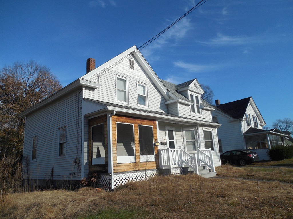 78 Bourne Street Three Rivers, MA 01080 - Photo 3 of 20 a front view of a house with a yard