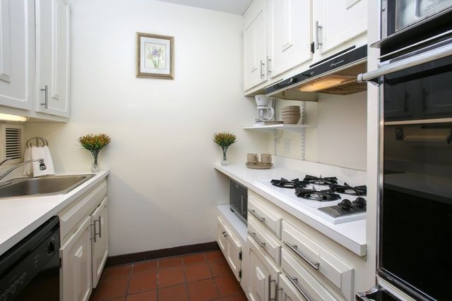 a bathroom with a sink toilet and vanity