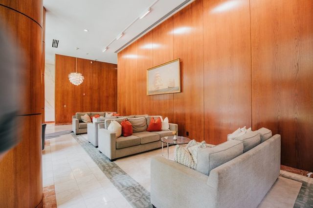 front view of a house with a swimming pool