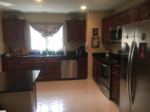 35 Parkside Drive Raphine, VA 24472 - Photo 2 of 8 a kitchen with stainless steel appliances granite countertop a refrigerator a sink a stove and microwave