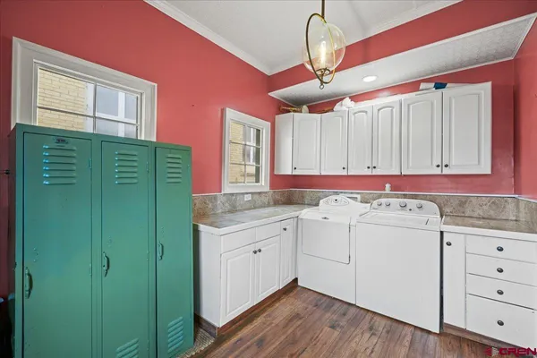a kitchen with cabinets a sink and dishwasher
