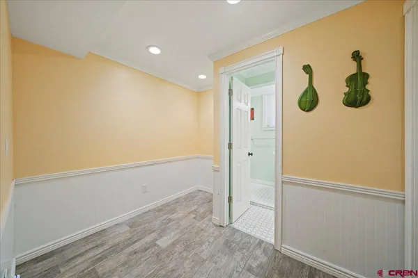 a bathroom with a sink a mirror and shower