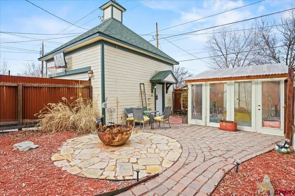 a utility room with cabinets and washer