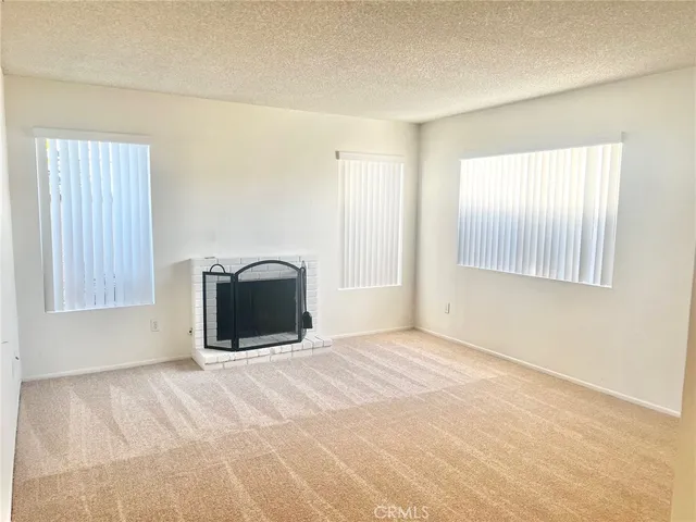 a view of a livingroom with a staircase