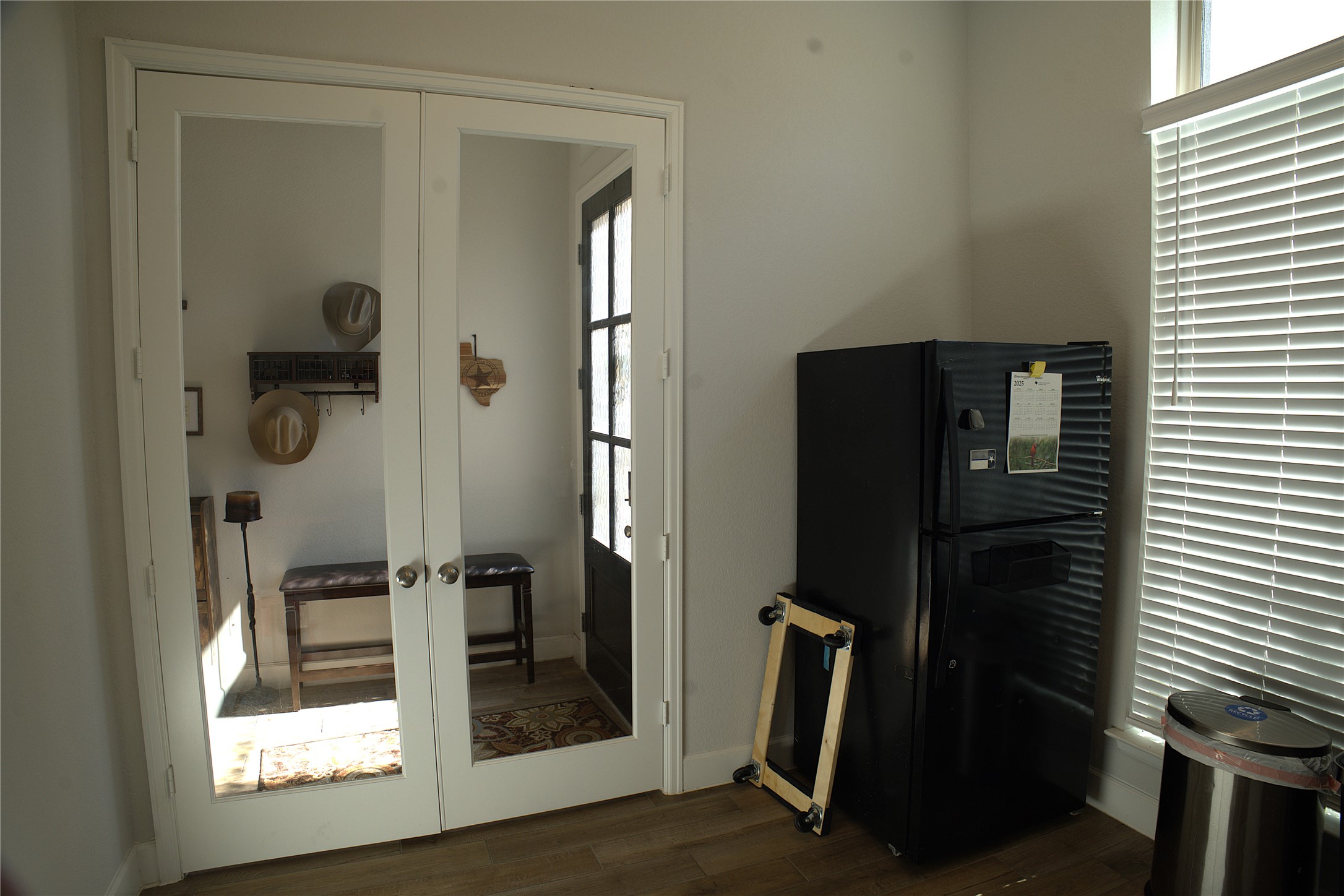284 Kimble Creek Loop Kyle, TX 78640 - Photo 24 of 37 Entryway featuring french doors and wood finished floors