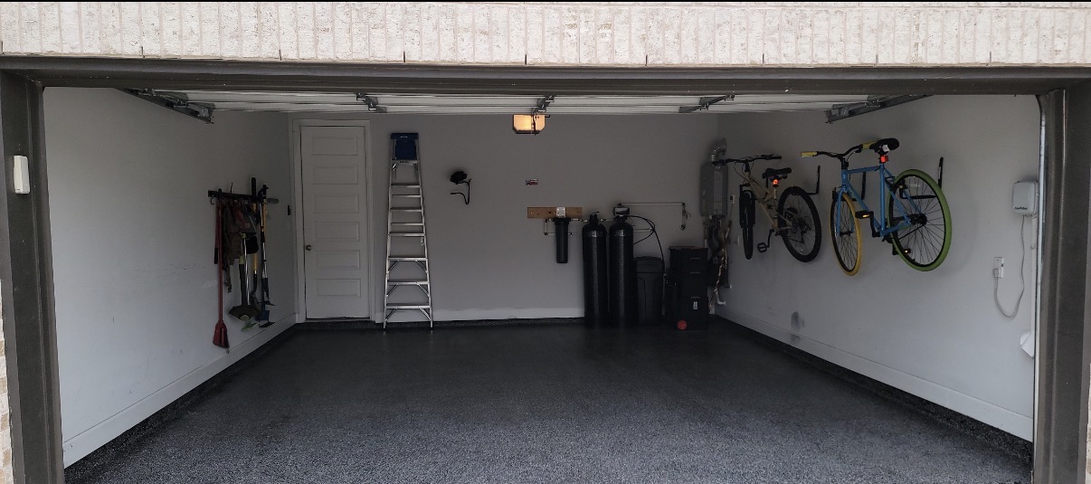 284 Kimble Creek Loop Kyle, TX 78640 - Photo 34 of 37 Finished Garage with baseboards, paint , and teflon coating floors