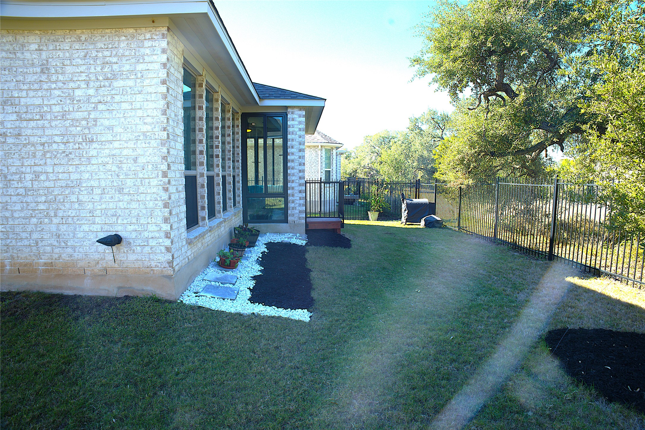 284 Kimble Creek Loop Kyle, TX 78640 - Photo 6 of 37 View of yard featuring a sunroom