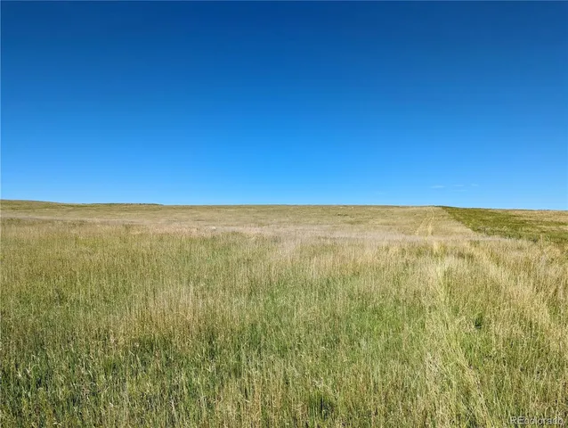 a view of beach and an ocean