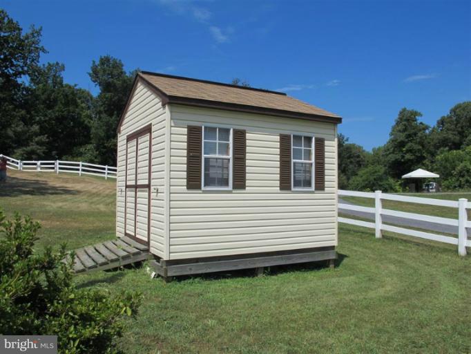 265 Skinners Turn Road Owings, MD 20736 - Photo 1 of 30 Convenient Yard Shed