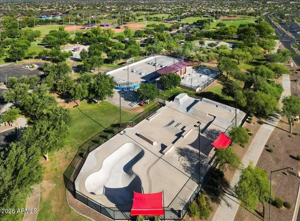 a view of a house with a window and yard