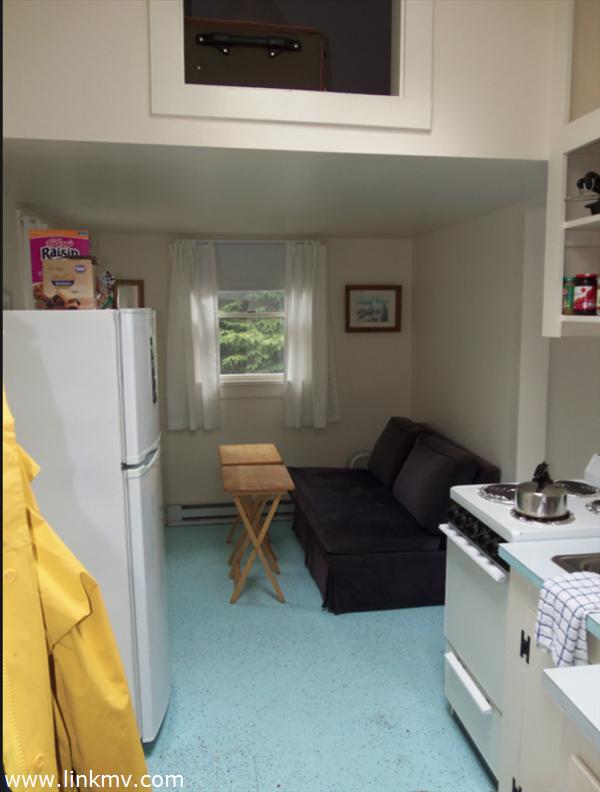 84 Pennywise Path Edgartown, MA 02539 - Photo 12 of 29 a living room with furniture and a window