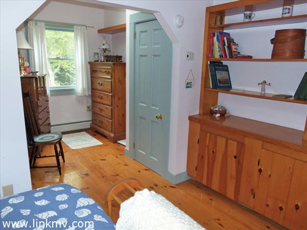 84 Pennywise Path Edgartown, MA 02539 - Photo 20 of 29 a bedroom with furniture and a window