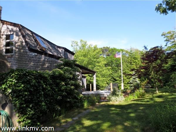 84 Pennywise Path Edgartown, MA 02539 - Photo 27 of 29 a view of house with a yard