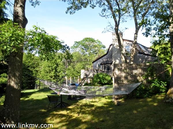 84 Pennywise Path Edgartown, MA 02539 - Photo 29 of 29 a view of a house with swimming pool and sitting area