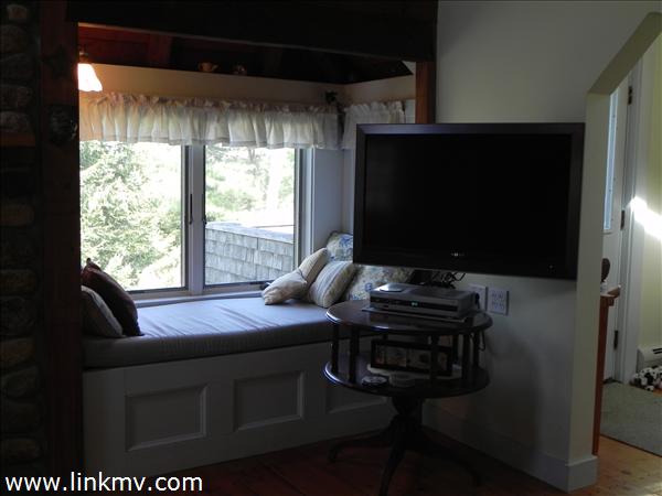 84 Pennywise Path Edgartown, MA 02539 - Photo 8 of 29 a living room with furniture and a flat screen tv