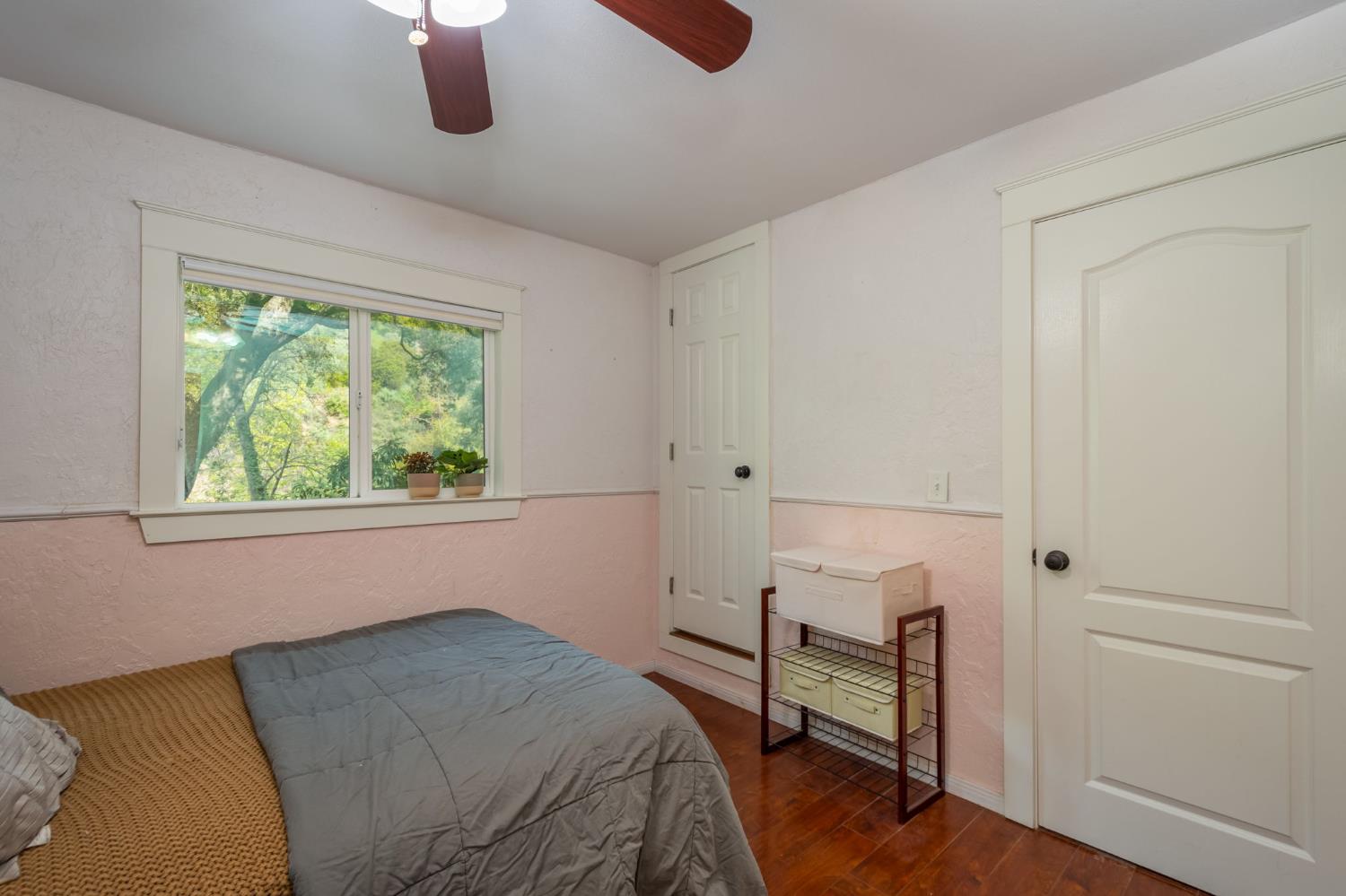 15663 Ojai Road Santa Paula, CA 93060 - Photo 15 of 47 a bedroom with a bed and a window