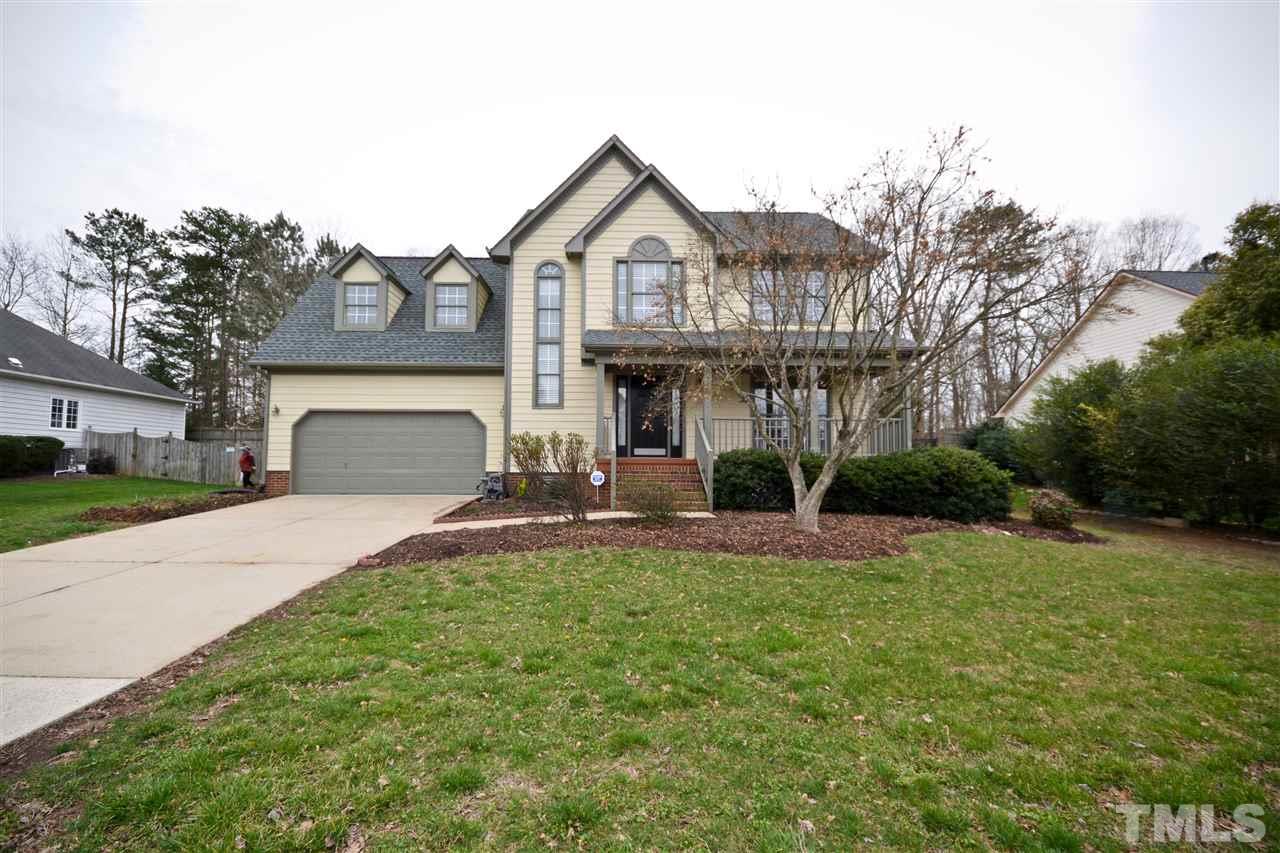 2341 Kendricks Court Raleigh, NC 27613 - Photo 1 of 29 a front view of a house with a yard and garage