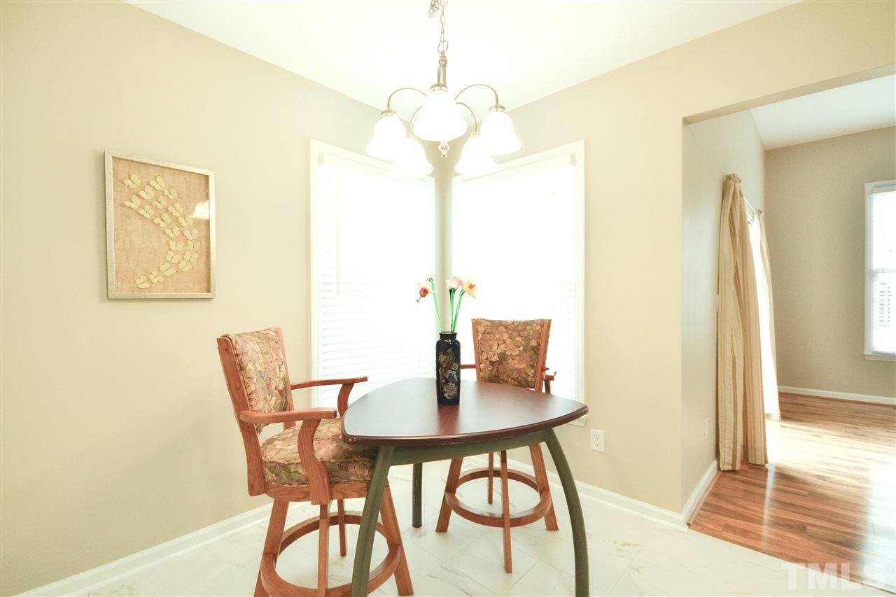 2341 Kendricks Court Raleigh, NC 27613 - Photo 12 of 29 a dining room with furniture and window