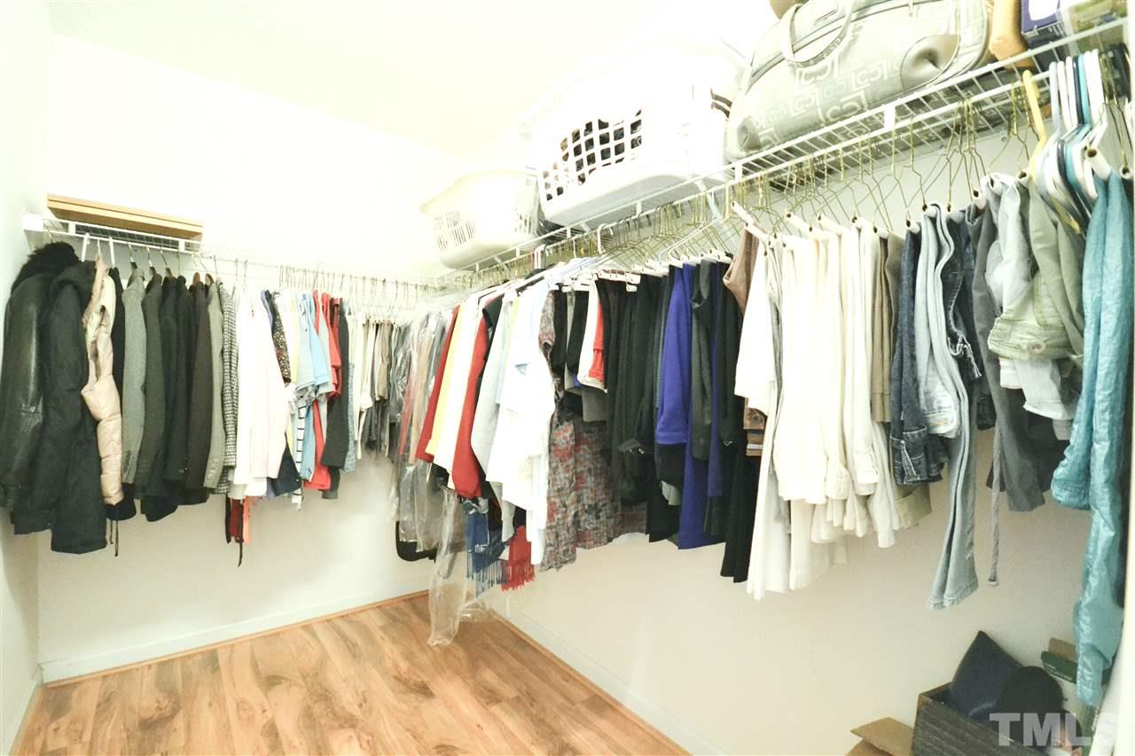 2341 Kendricks Court Raleigh, NC 27613 - Photo 20 of 29 a view of walk in closet with clothes and shoes