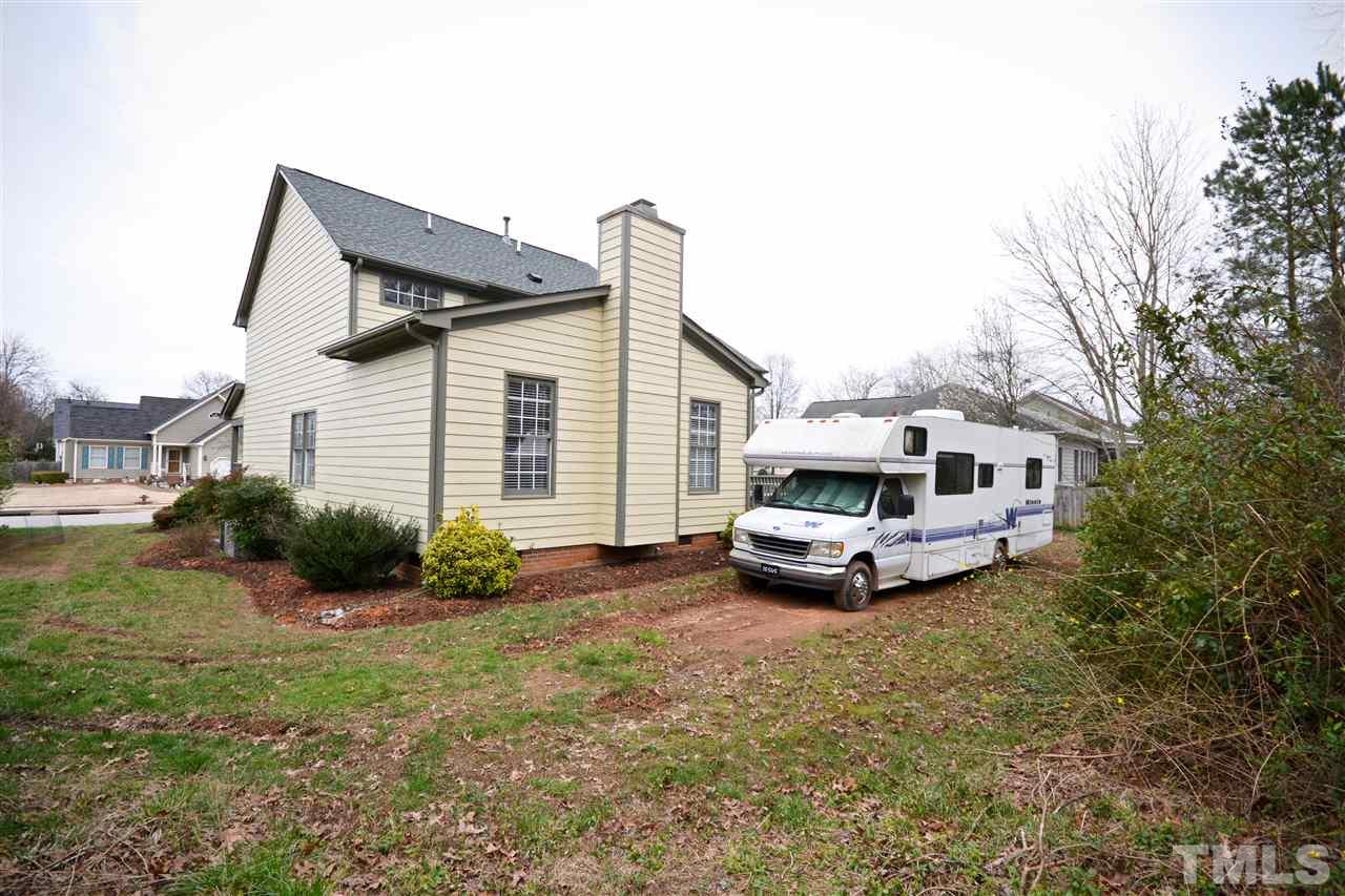 2341 Kendricks Court Raleigh, NC 27613 - Photo 29 of 29 a view of a house with backyard and plants