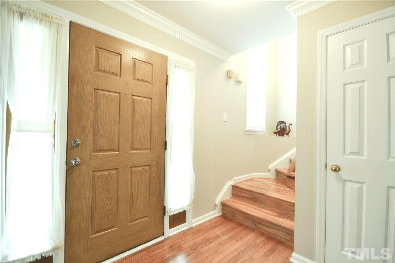 2341 Kendricks Court Raleigh, NC 27613 - Photo 4 of 29 a spacious bathroom with a glass door shower and a bathtub