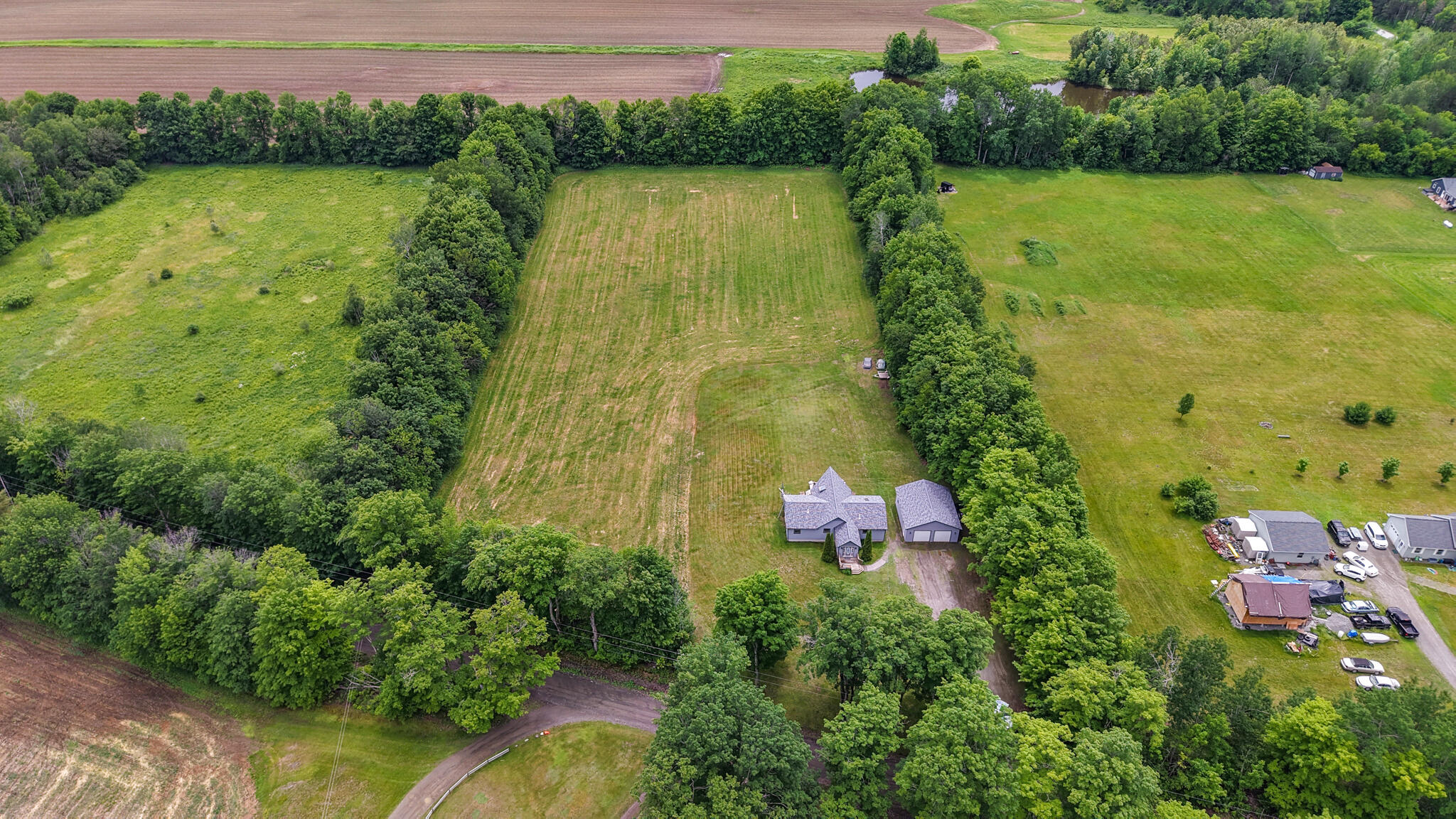 37 West Barker Road Corinna, ME 04928 - Photo 9 of 35 dji_fly_20260615_130410_0708_17815431331