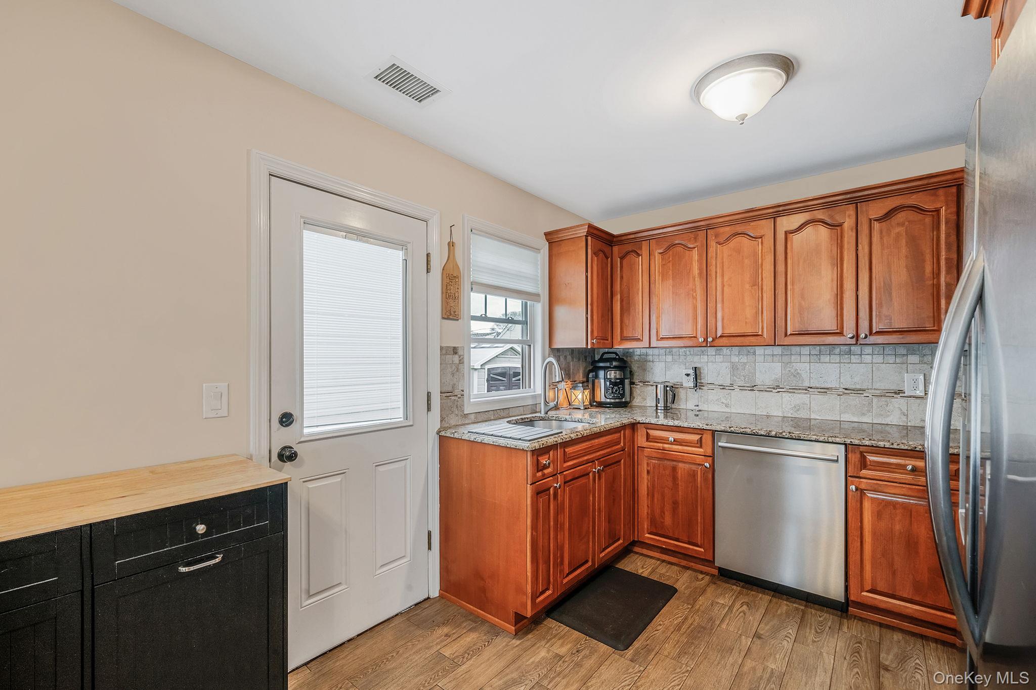 253 East Riviera Drive Lindenhurst, NY 11757 - Photo 9 of 24