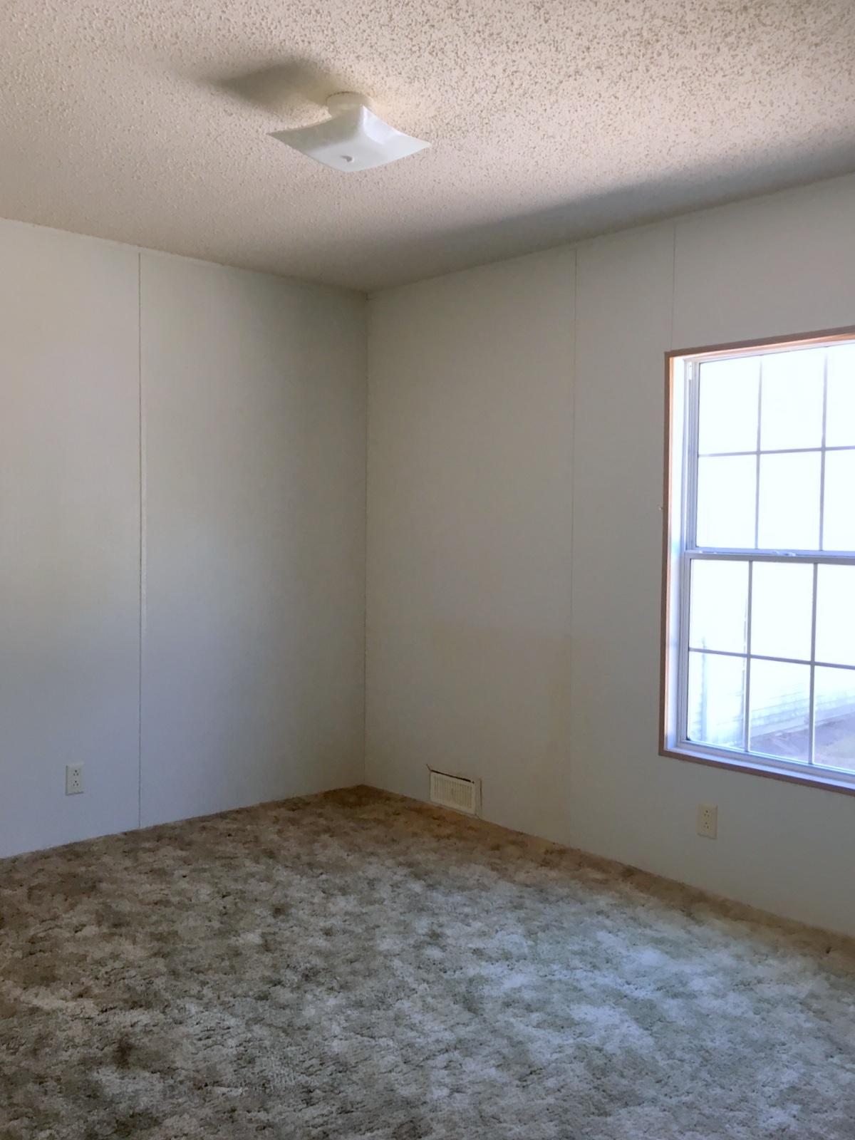 882 Don Graff Road Freeport, FL 32439 - Photo 13 of 22 an empty room with a window