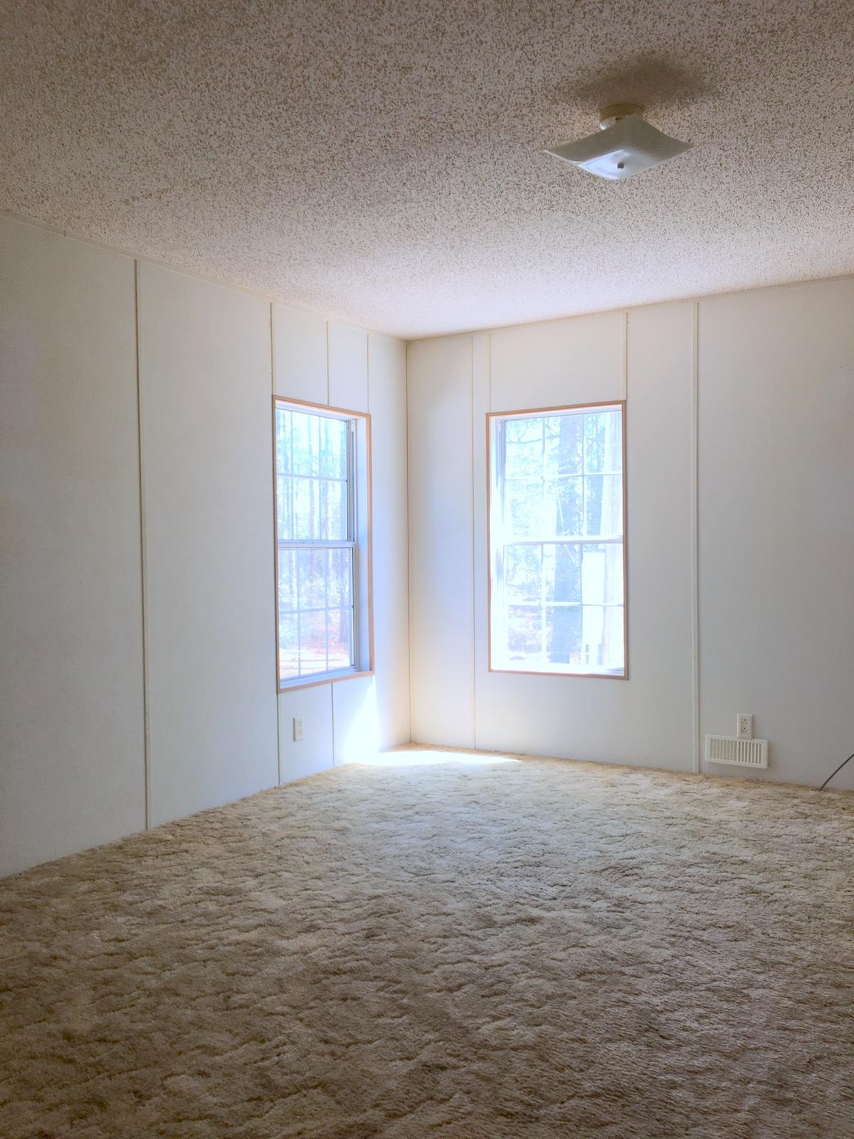 882 Don Graff Road Freeport, FL 32439 - Photo 6 of 22 a view of an empty room with a window