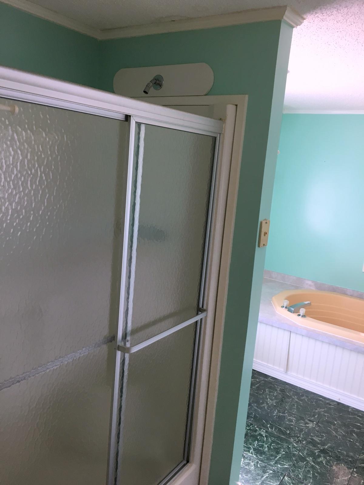 882 Don Graff Road Freeport, FL 32439 - Photo 8 of 22 a room with cabinets and a wooden door