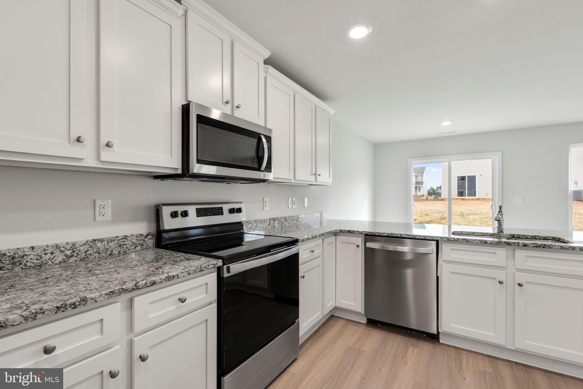*Photo is an example of the home to be built.