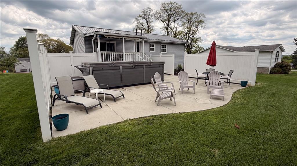 1403 2nd Avenue Beaver, PA 15009 - Photo 12 of 17 a view of backyard with a garden and sitting area