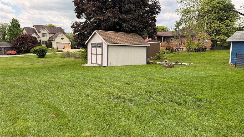 1403 2nd Avenue Beaver, PA 15009 - Photo 14 of 17 a view of a yard with a house and garden
