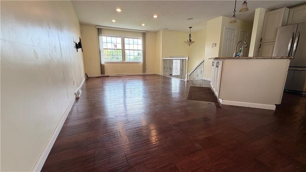 1403 2nd Avenue Beaver, PA 15009 - Photo 3 of 17 a view of a kitchen with wooden floor and a window