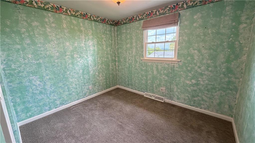 1403 2nd Avenue Beaver, PA 15009 - Photo 7 of 17 a view of a small space with wooden floor and a window