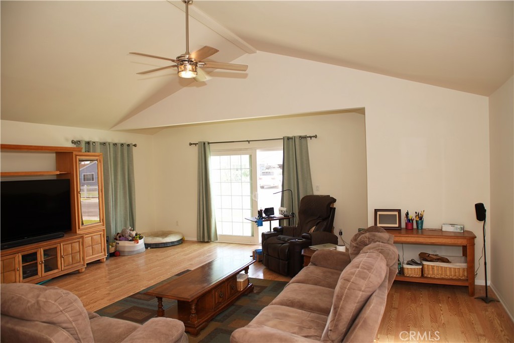 6431 Cathay Circle Buena Park, CA 90620 - Photo 20 of 65 a living room with furniture and a flat screen tv