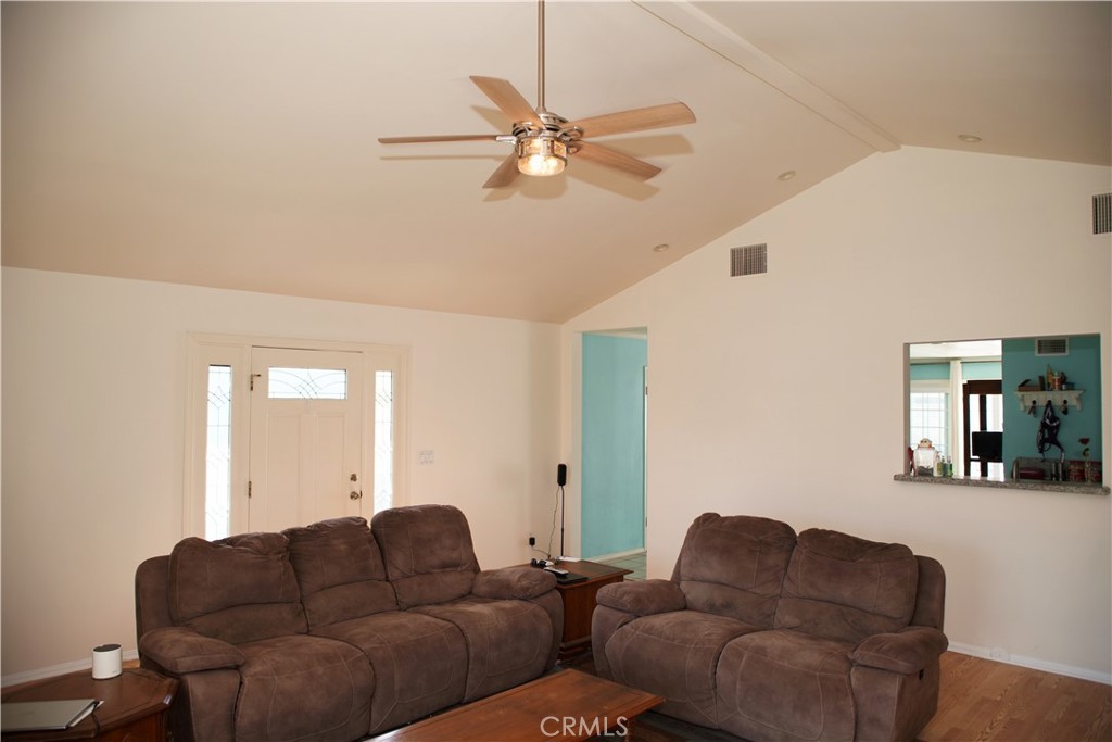 6431 Cathay Circle Buena Park, CA 90620 - Photo 22 of 65 door to the right leads to the kitchen. Nice pass through or breakfast bar.