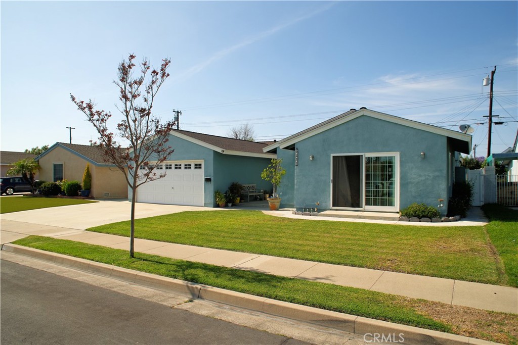 6431 Cathay Circle Buena Park, CA 90620 - Photo 3 of 65 a house view with a garden space