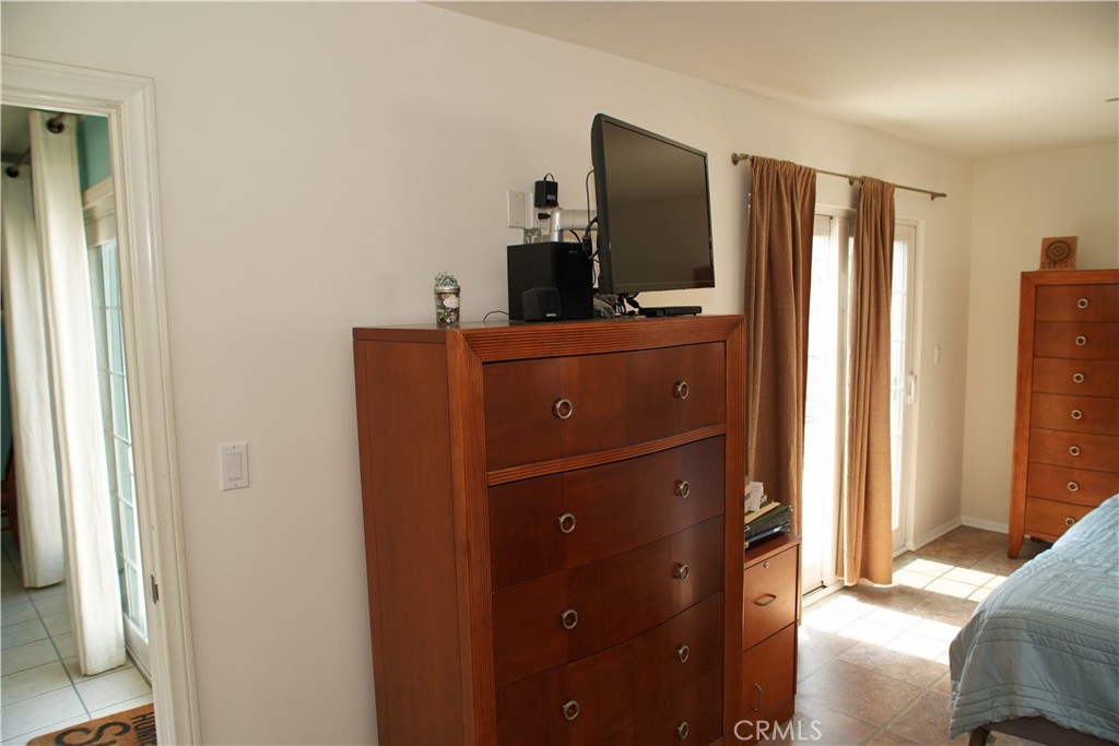 6431 Cathay Circle Buena Park, CA 90620 - Photo 34 of 65 a kitchen with stainless steel appliances granite countertop a refrigerator and a refrigerator