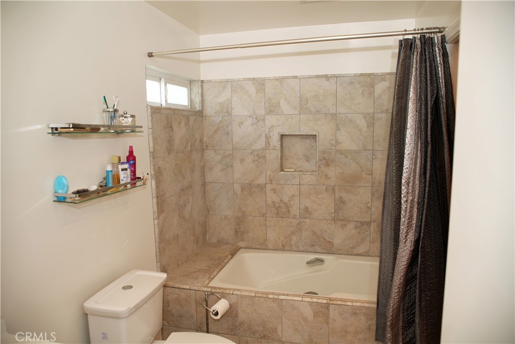 6431 Cathay Circle Buena Park, CA 90620 - Photo 37 of 65 Large tub with shower and new toilet. Closet to the right.