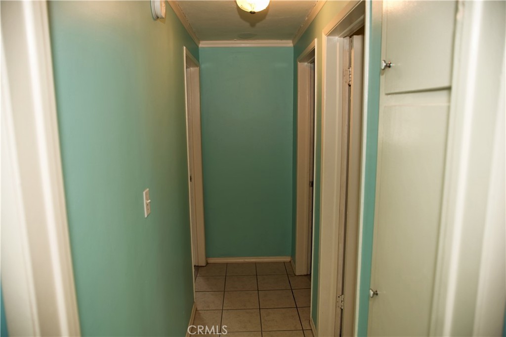 6431 Cathay Circle Buena Park, CA 90620 - Photo 43 of 65 Door to bedroom #2 down hallway to the left. Bathroom to the right