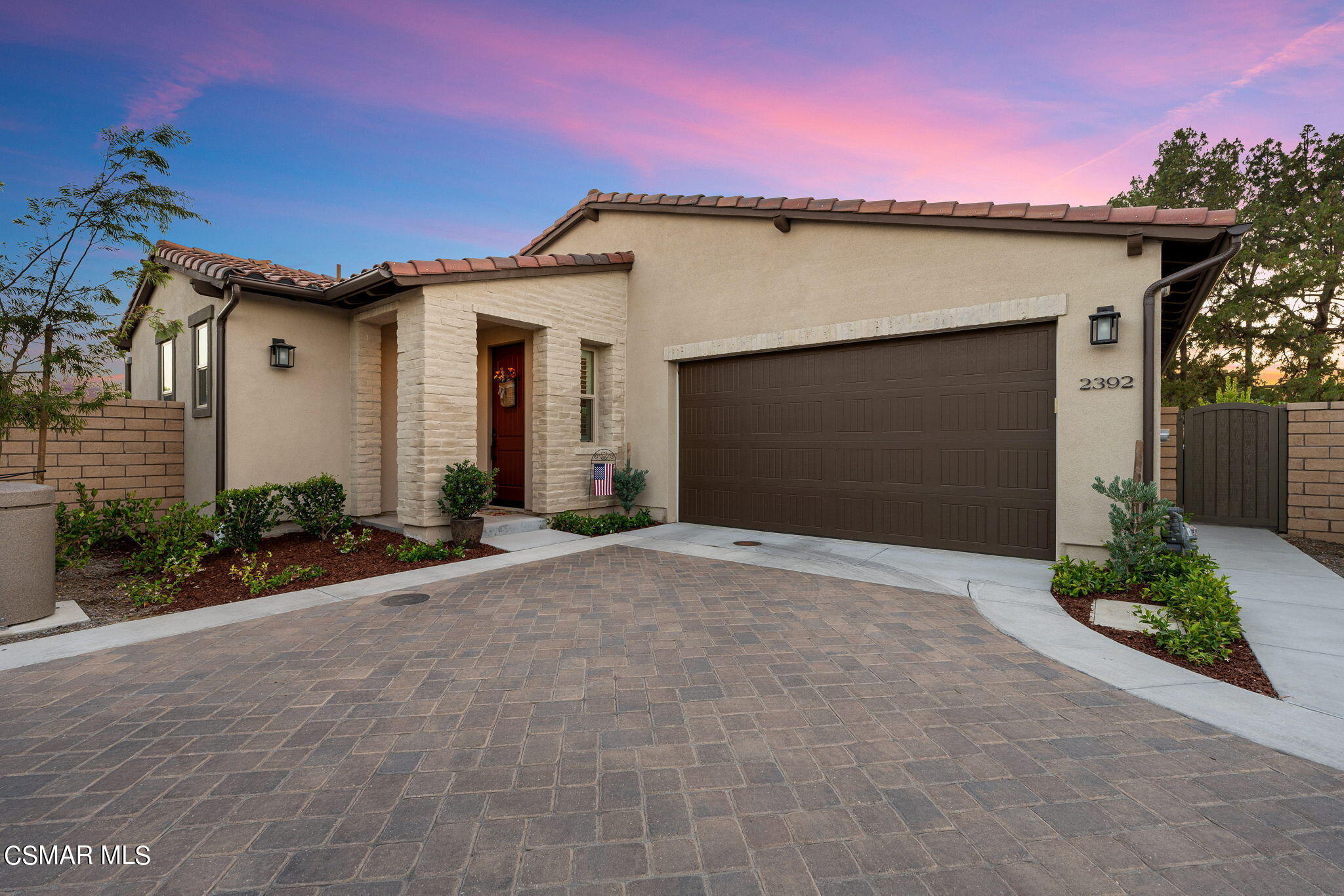 2392 Rondell Road Camarillo, CA 93012 - Photo 1 of 81 a front view of a house with a yard and garage