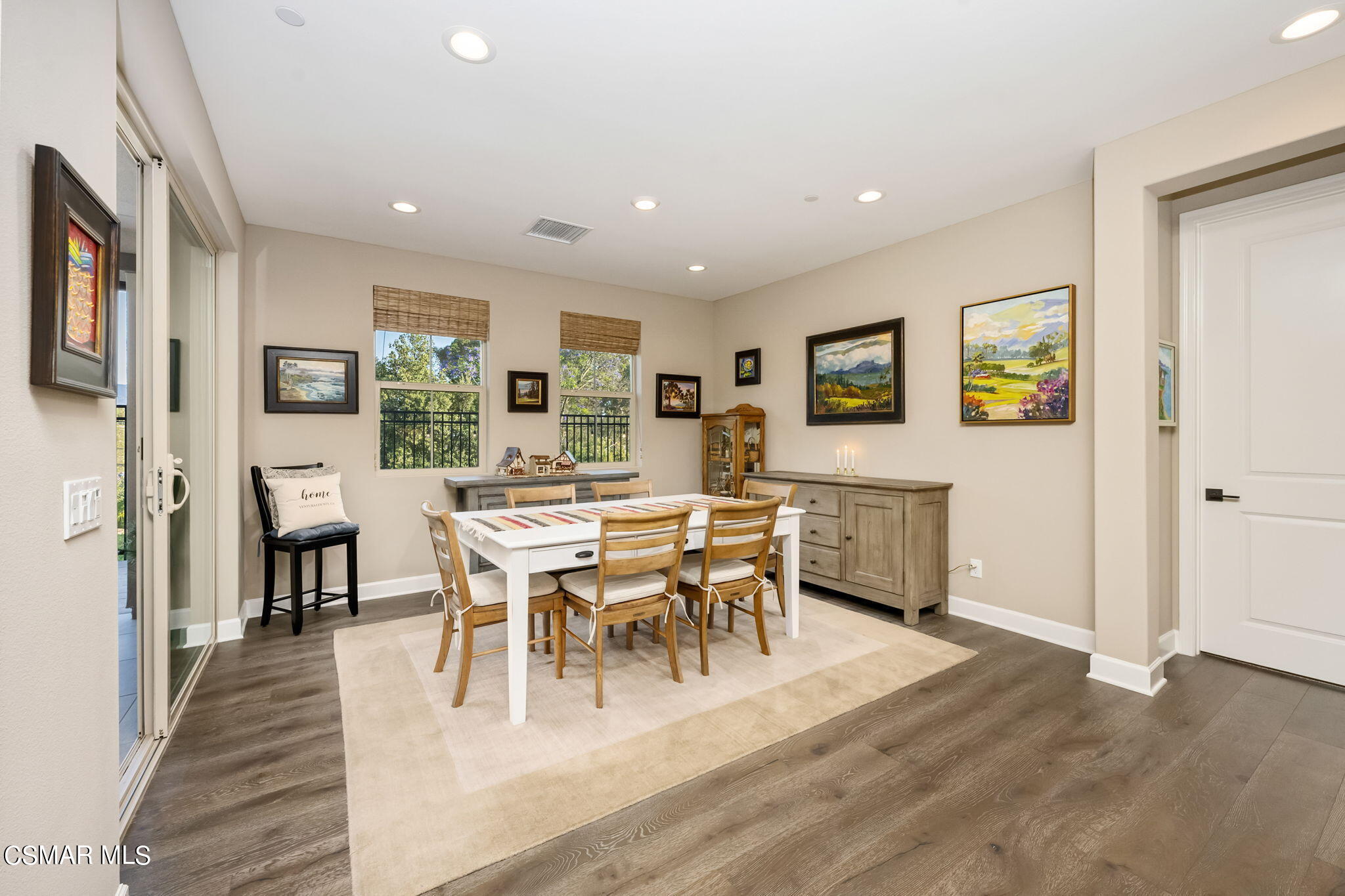 2392 Rondell Road Camarillo, CA 93012 - Photo 27 of 81 a view of a dining room with furniture and wooden floor