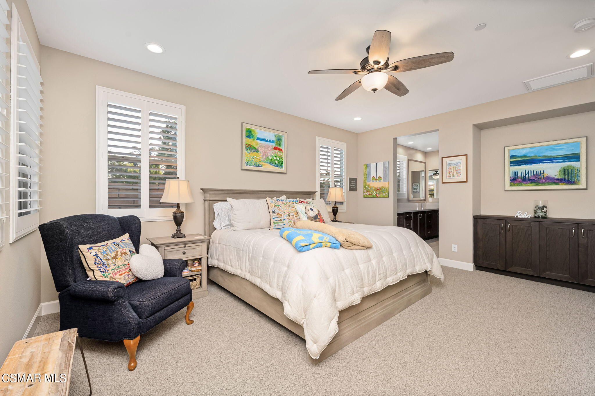 2392 Rondell Road Camarillo, CA 93012 - Photo 34 of 81 a spacious bedroom with a bed and a couch
