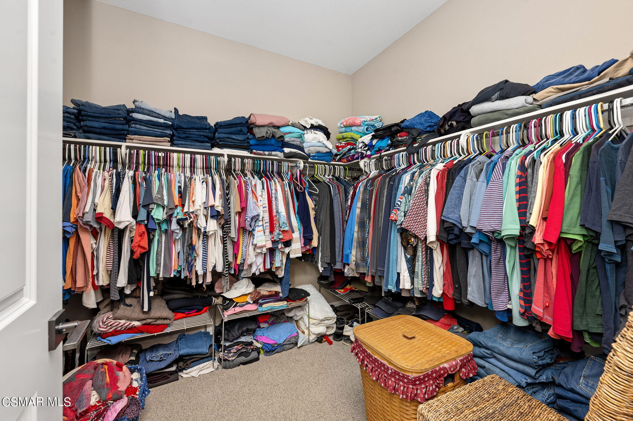 2392 Rondell Road Camarillo, CA 93012 - Photo 40 of 81 a view of walk in closet with clothes