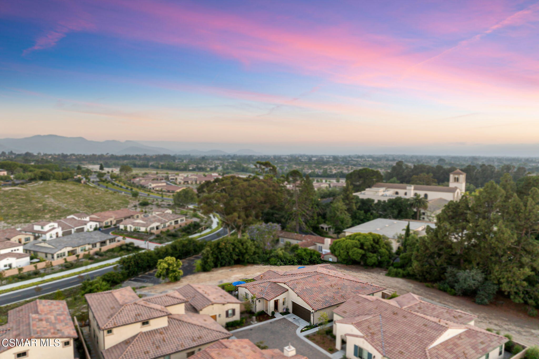 2392 Rondell Road Camarillo, CA 93012 - Photo 54 of 81 an aerial view of a city with lots of residential buildings ocean and mountain view in back