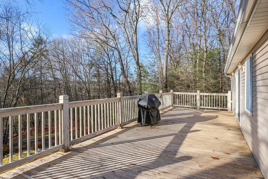 15 Deepwood Road Stafford, CT 06076 - Photo 3 of 30 a deck view with a seating space
