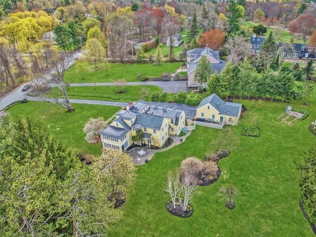 101 Holt Road Andover, MA 01810 - Photo 1 of 38 a view of a table and chairs in the garden
